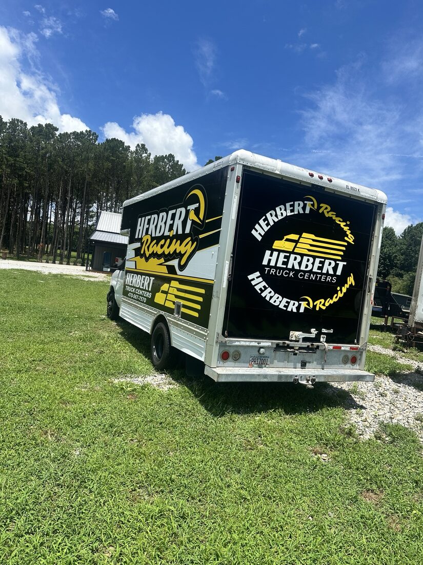 Rear view of Herbert Racing box truck wrap